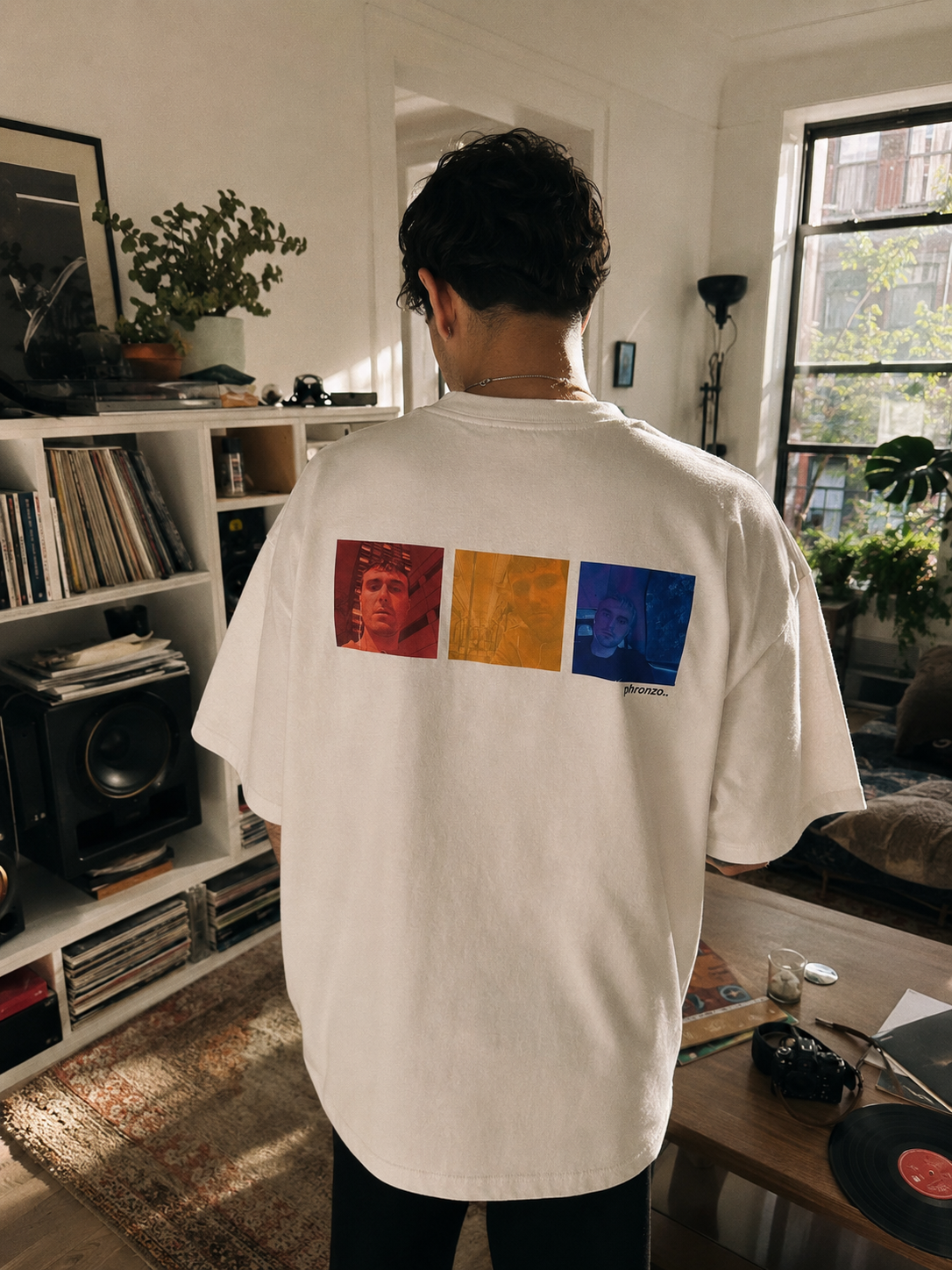 Model wearing The One With Fred oversized graphic T-shirt showing the back print