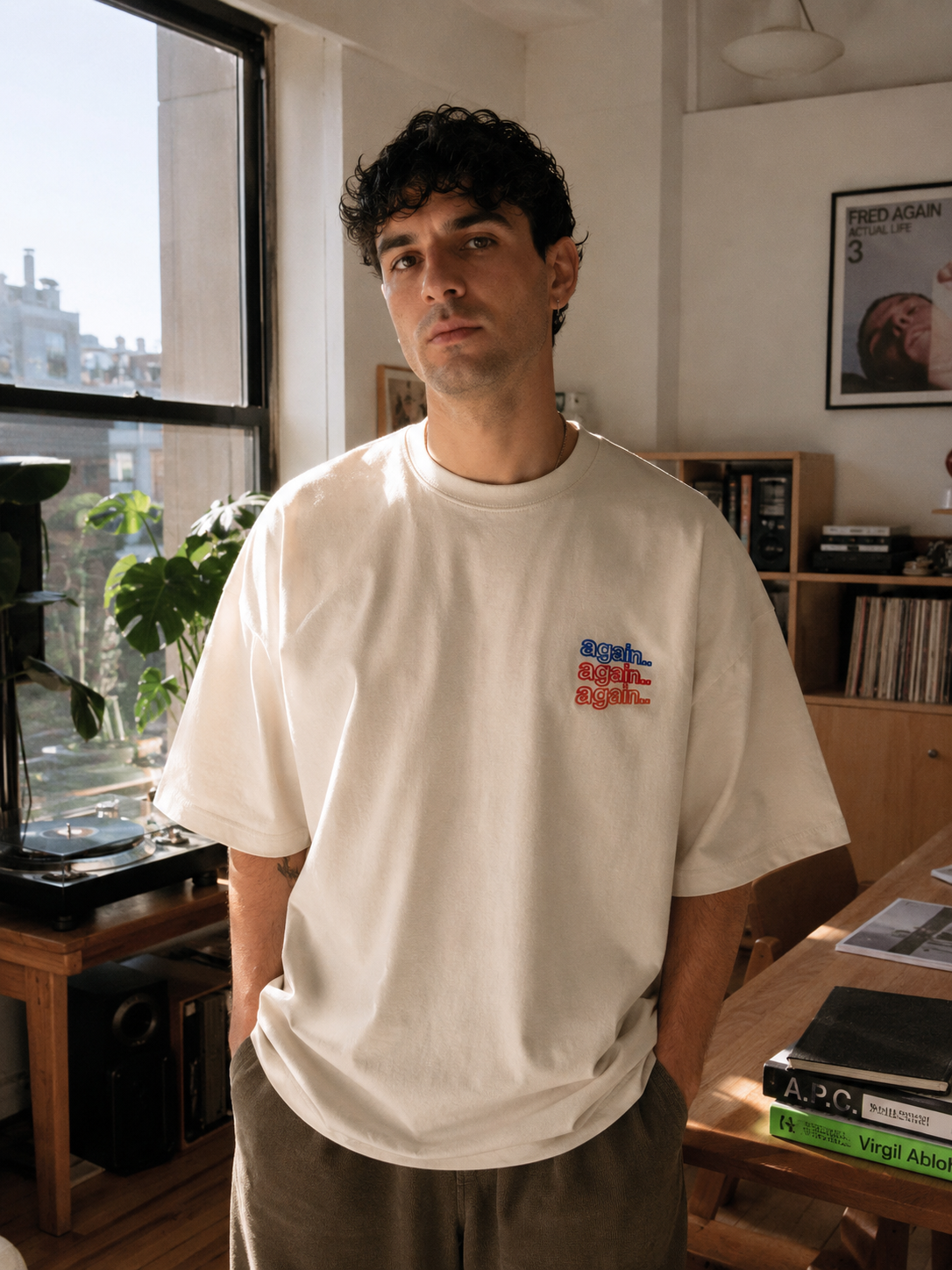 Model wearing The One With Fred oversized graphic T-shirt in cream with front artwork